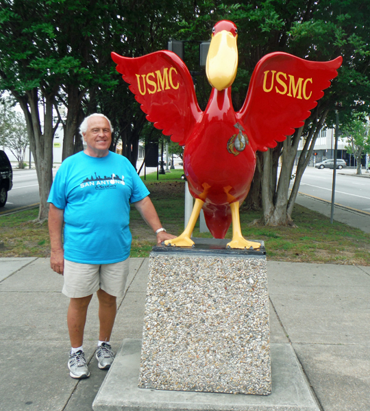 Lee Duquette and a USMC Pelican statue